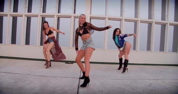 All Girl Dance Crew Performing Routine On Rooftop