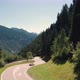 Aerial View of Cars Driving a Mountain Road in Alps, Switzerland  - VideoHive Item for Sale