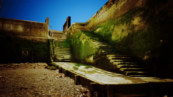 Old Wall and Stairs Covered in Moss