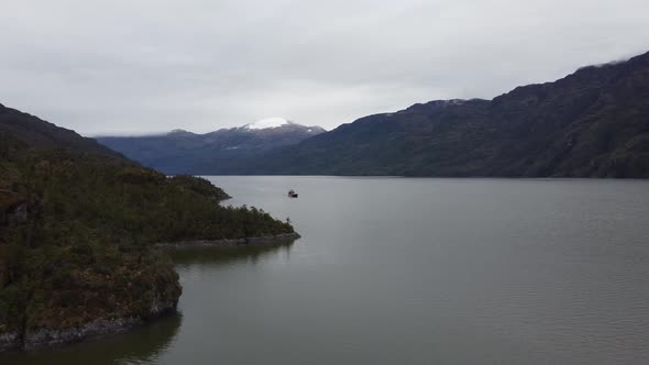 Aerial view of Fjord Mitchel. Far away view of a free ferry on Carretera Austral, Chile. Patagonia,