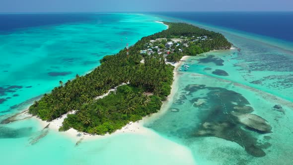 Aerial panorama of paradise tourist beach voyage by aqua blue ocean with white sand background of ad