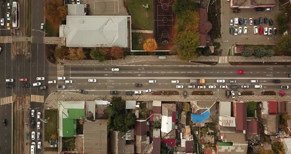 Top Down Drone Point of View - Steet City Road Intersection in Autumn Time