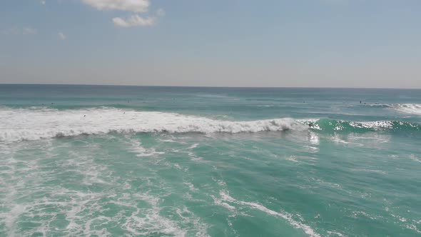 Aerial View of Surfer on the Wave Indonesia Ocean