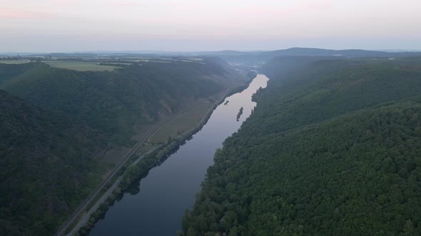 drone flight passing the moselle river in the german rhineland palatinate area near the city of klot