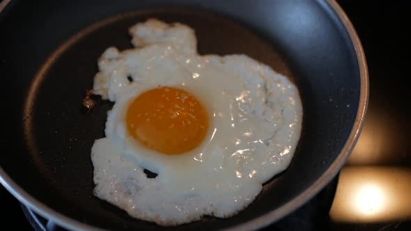 Cooking Sunny Side Up Egg In A Pan - Food For Breakfast - close up