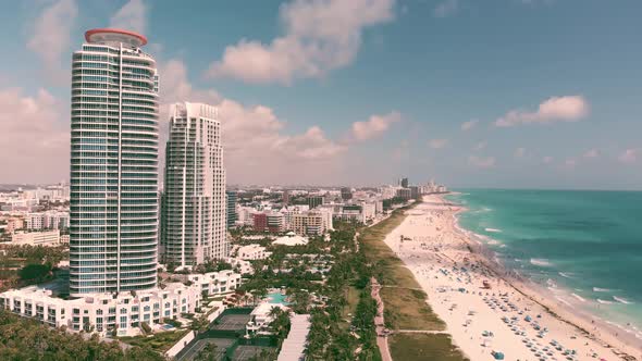 Miami Beach From South Pointe Park Slow Motion Aerial View on a Beautiful Sunny Day