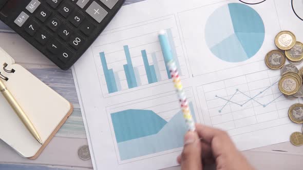 Financial Graph Calculator and Notepad on Table