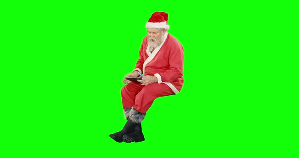 Santa claus doing christmas shopping online 4k