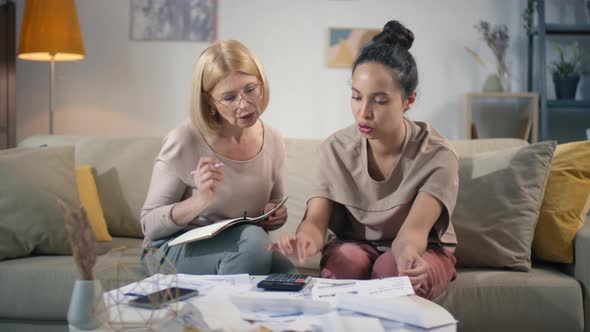 Women Counting Family Budget Together