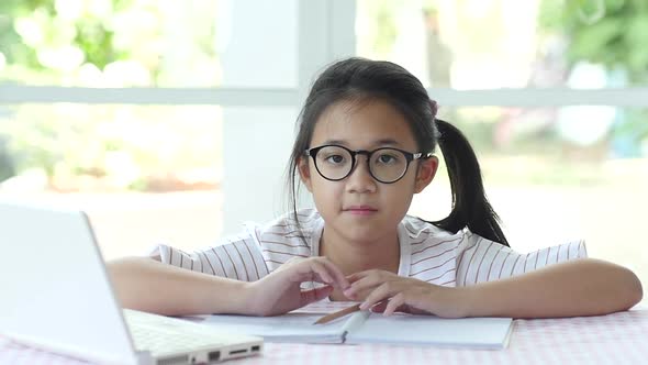 Asian Girl Is Trying Hard With Her Homework Slow Motion