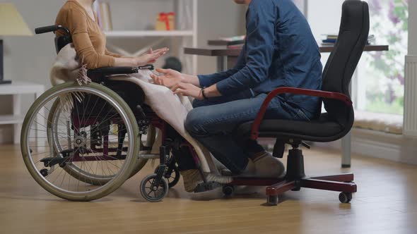 Side View Unrecognizable Disabled Young Slim Woman Refusing Support of Loving Man