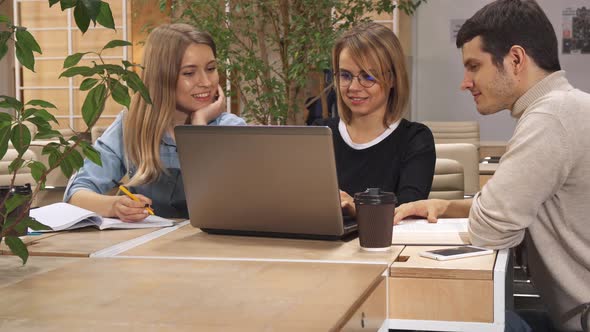 Girl Tells Her Coworkers To Look at Her Laptop