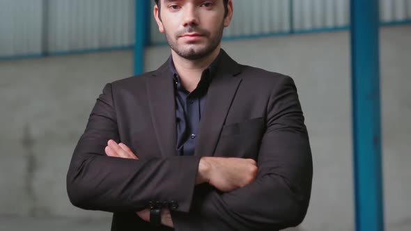 Portrait Confident Factory Manager Wearing Suit and Safety Helmet