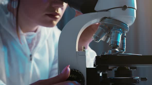 Doctor Video Footage - Close Up View Of A Person Looking Through The Microscope