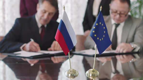 Russian And EU Diplomats Signing Cooperation Agreement