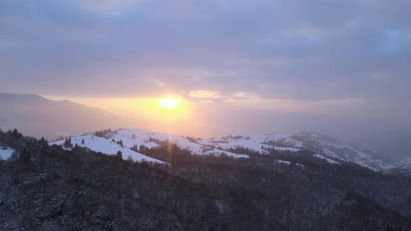 Aerial Drone View of a Snowy Sunset in Carpathian Mountains in Ukraine