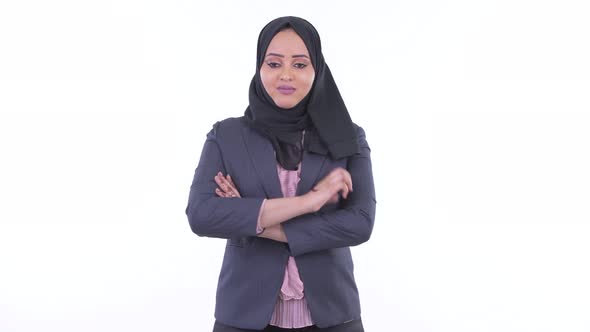 Happy Young African Muslim Businesswoman Smiling with Arms Crossed