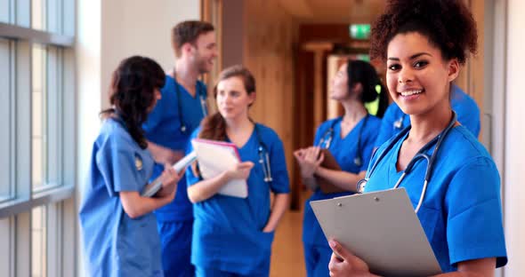 Medical Students Chatting in Hallway