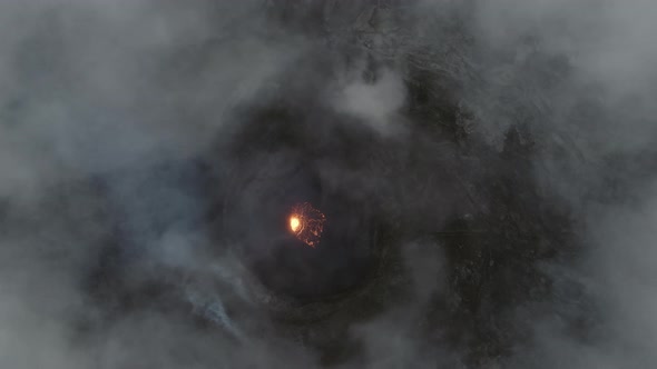 Drone Over Volcano With Lava Forming In Crater