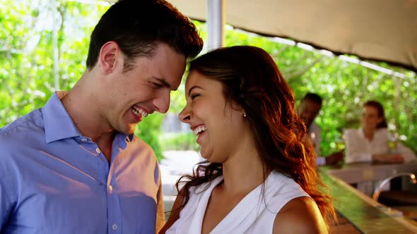 Couple having fun together in restaurant