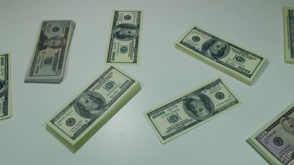 Dollars On The Table In A Modern Office