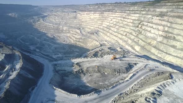 Upper View Large Asbestos Pit with Distant Excavators