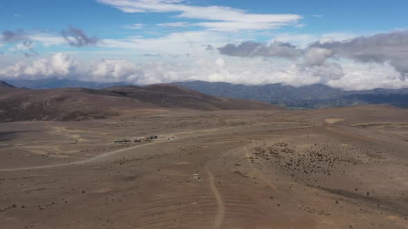 Aerial view of a large plain and the entrance to chimboraso vulcano in ecuador south america