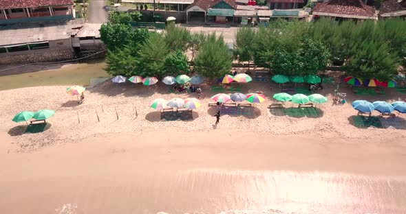 tropical beach with white sand and trees in Siung beach, Yogyakarta, Indonesia. a must-visit beach i