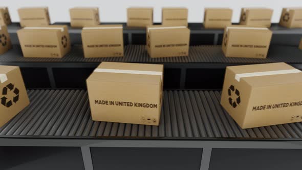 Boxes with MADE IN United Kingdom Text on Conveyor