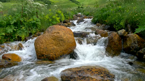 Mountain River with Crystal Clear Water, Sliding Shot