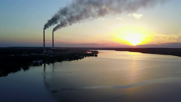 Smoke From The Pipe Factory Near The River