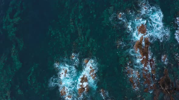 Top View of the Surface of the Atlantic Ocean with Rocks Protruding From the Water Off the Coast of