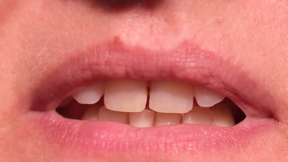 Mouth of a Woman Talking to the Camera