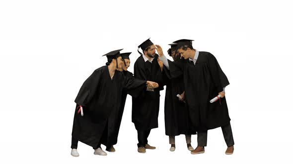 Happy Friends Graduates Join Hands Together The Concept of a Friendly Team on White Background.