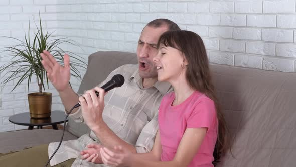 Sing with dad. Family karaoke. 