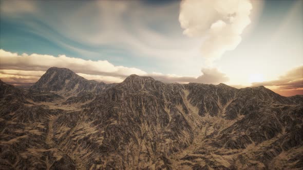 Sun Rays Against the Backdrop of the Mountains