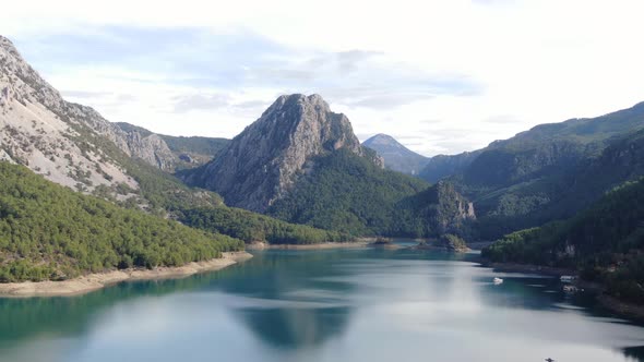 Mountain and River with a Beautiful View of Clıuds