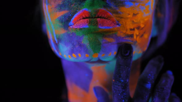 A Girl's Face with an Ultraviolet Pattern in the Light of a Fluorescent Lamp