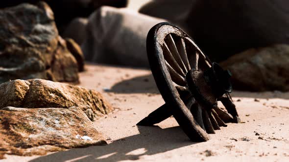 Old Wooden Cart Wheel at Sand Beach