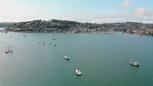 Aerial fly over yachts at anchor in beautiful harbour of Kinsale co cork ireland, a very popular tou