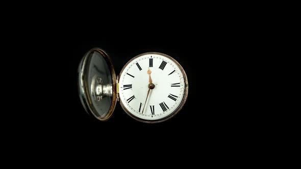 Vintage Pocket Watch Rotate Arrows Go. Black Background. Time Lapse