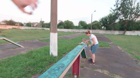 Family on a Balance Log