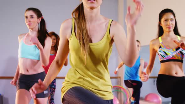 Group of women performing aerobics exercise