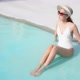 Young asian woman enjoy around outdoor swimming pool for leisure - VideoHive Item for Sale