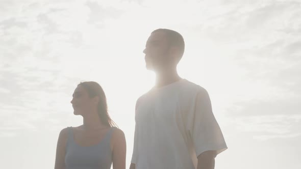 Guy and Girl Holding Hands Walking