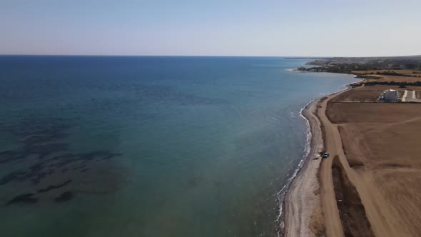 Cyprus beach at daytime. Mediterranean Sea. Beautiful views of the coast. Larnaca District.