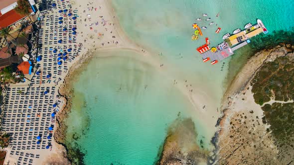 Aerial View of Nissi Beach in Ayia Napa Drone Flies Over Beach with Lot of Tourists