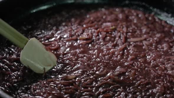 Chef at Work Cooking Sause with Wine