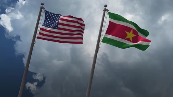 Waving Flags Of The United States And The Suriname 4K