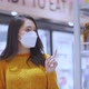 shopping in covid spread,asian female adult woman wearing face mask protection - VideoHive Item for Sale
